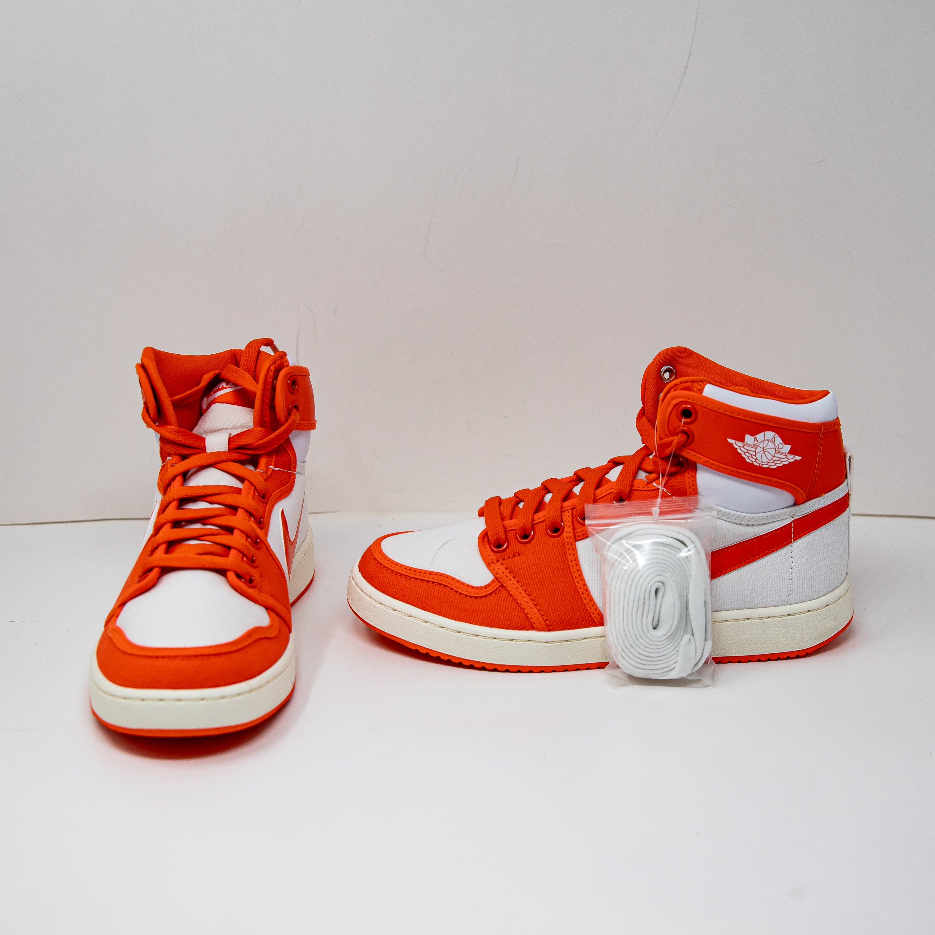 NEW Nike Men's Jordan 1 Retro AJKO Syracuse Rush Orange White High Top Sneakers