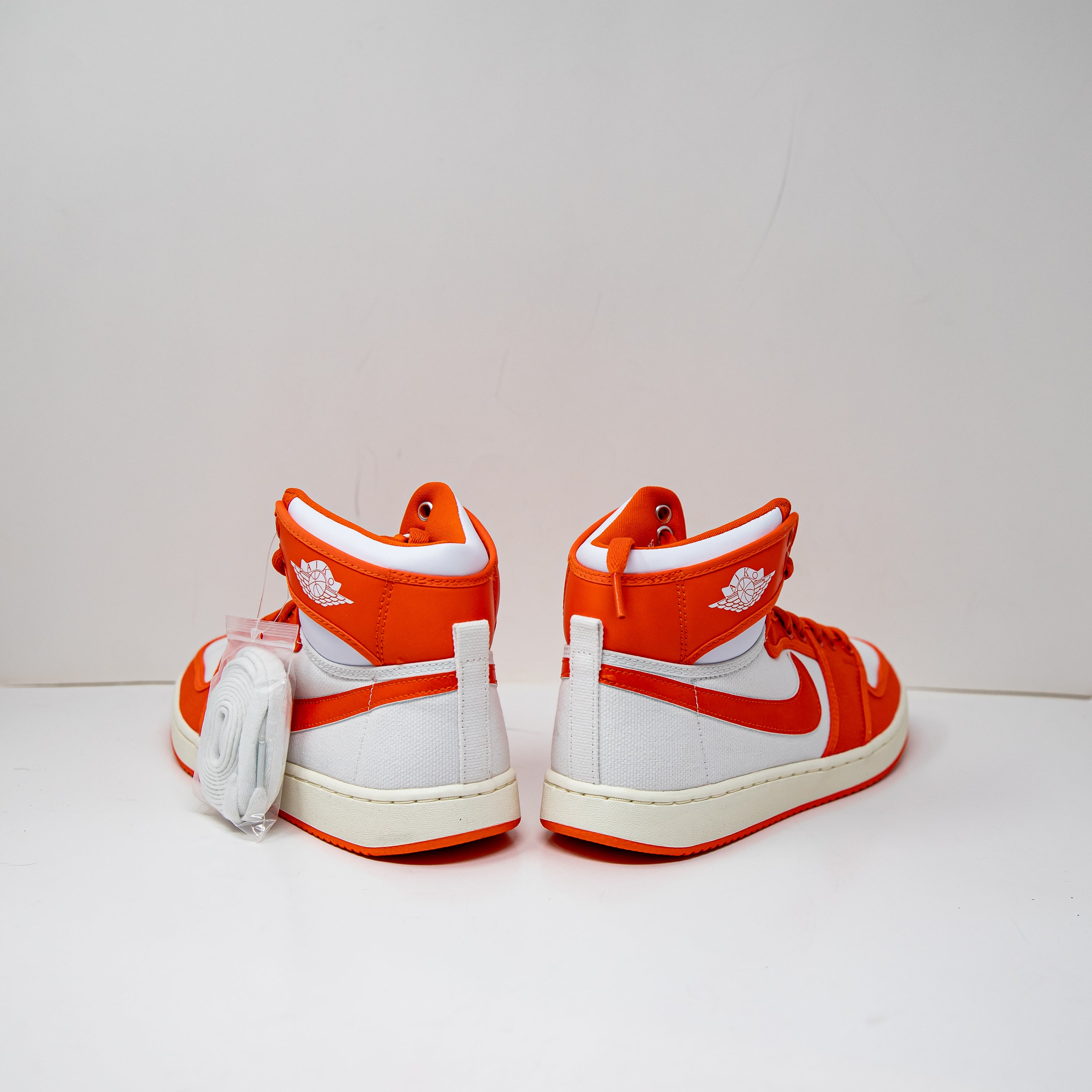 NEW Nike Men's Jordan 1 Retro AJKO Syracuse Rush Orange White High Top Sneakers