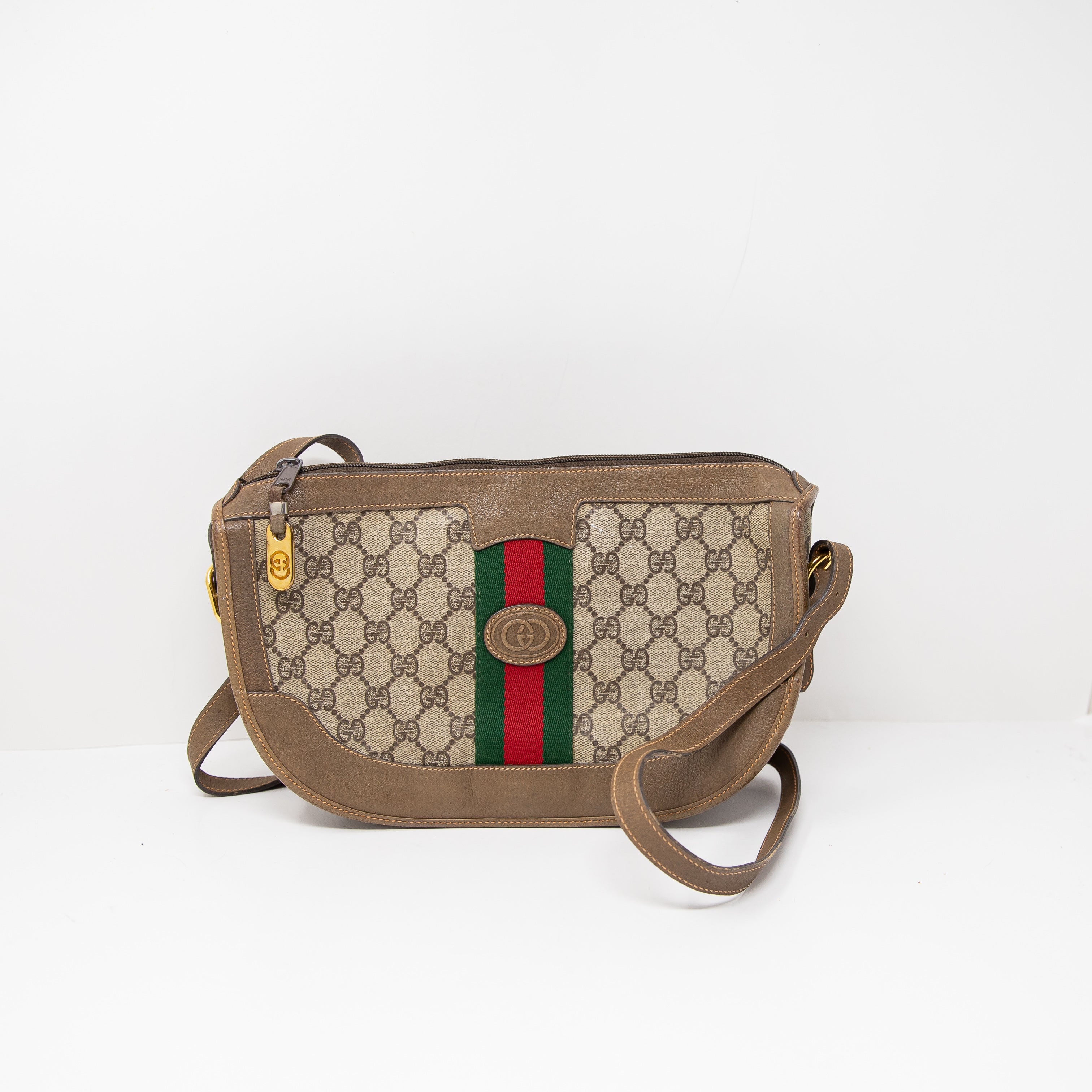 Gucci Bree Mini Vintage GG Monogram Coated Canvas Leather Crossbody Purse Bag