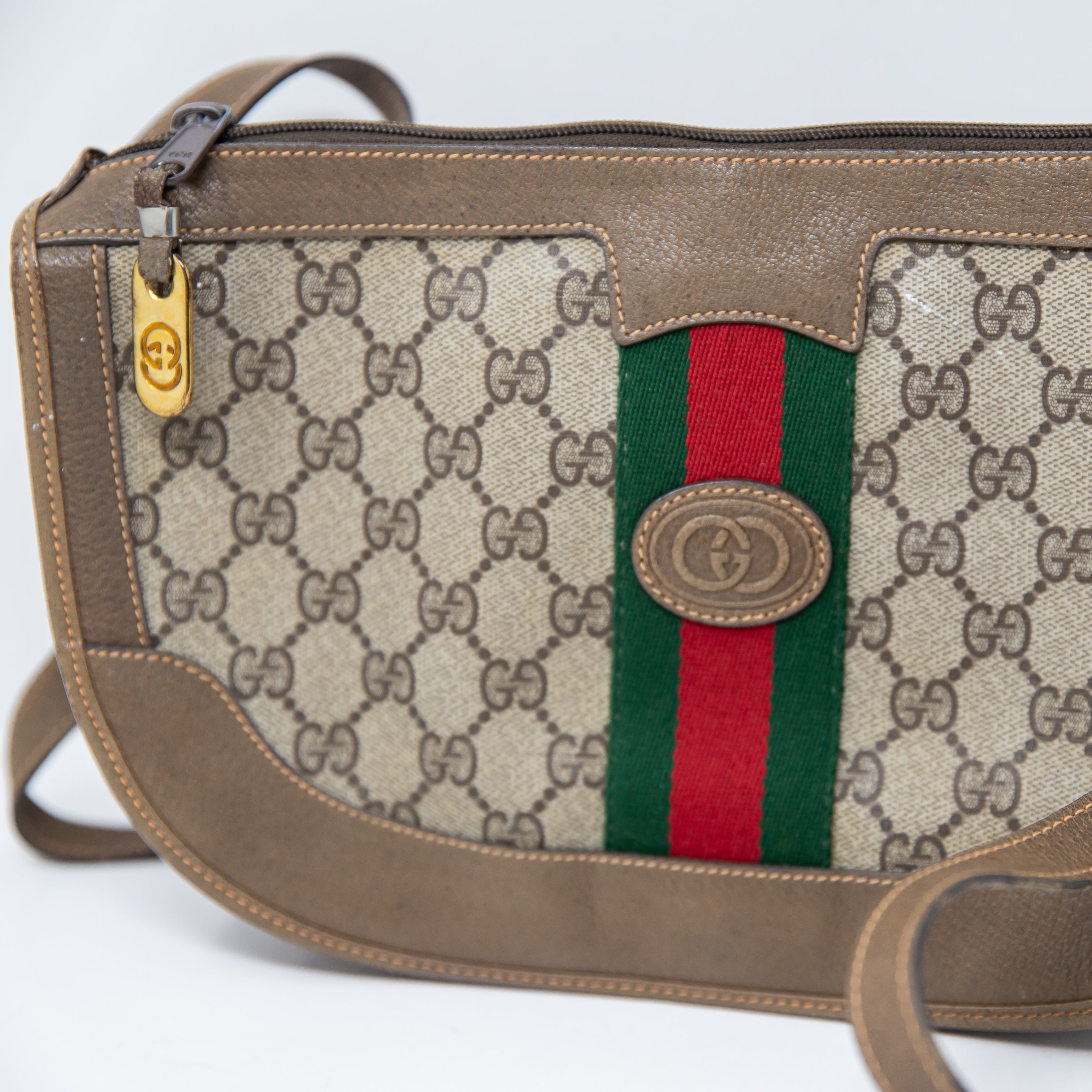Gucci Bree Mini Vintage GG Monogram Coated Canvas Leather Crossbody Purse Bag