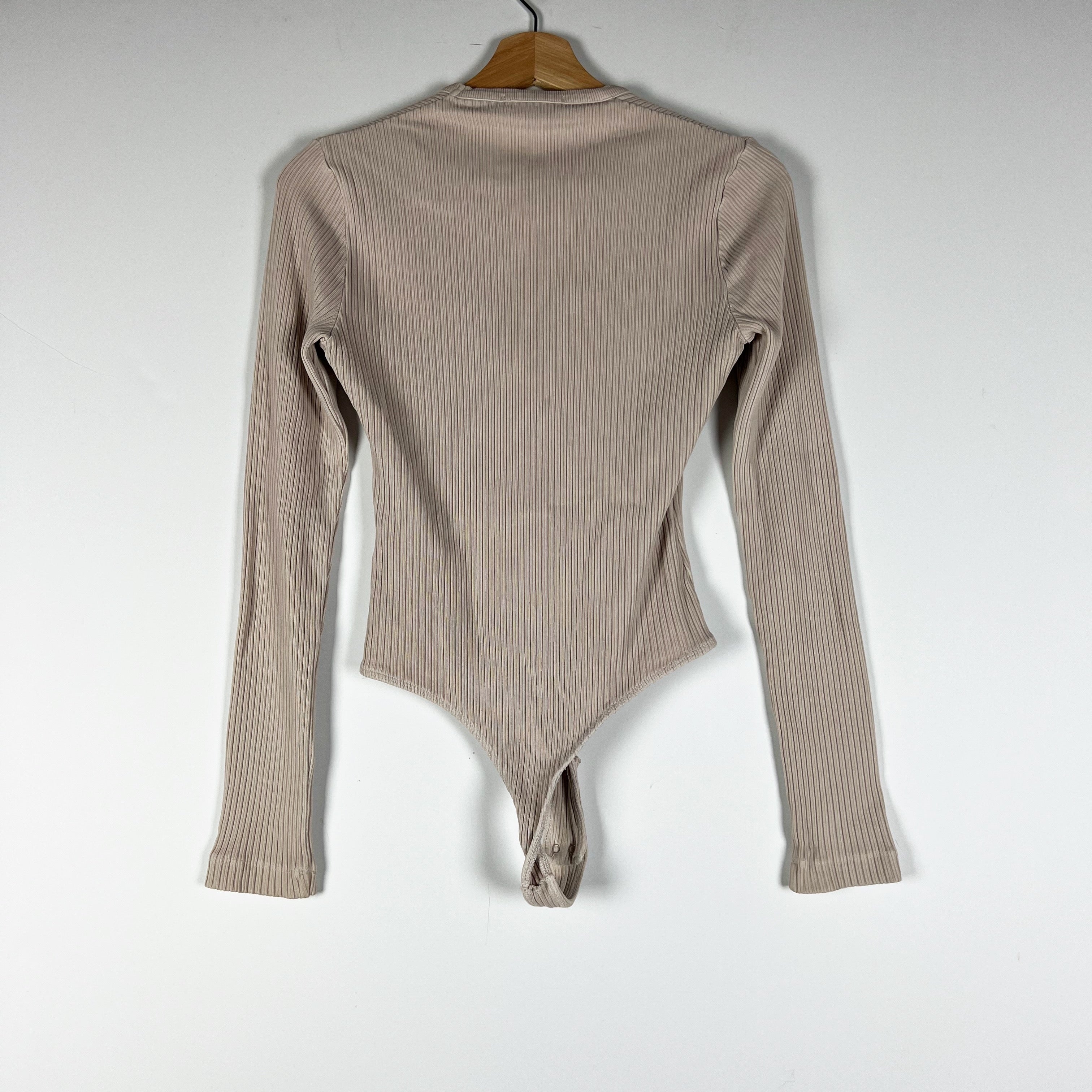 Agolde Tavi Organic Cotton Ribbed V Neck Long Sleeve One Piece Bodysuit Neutral