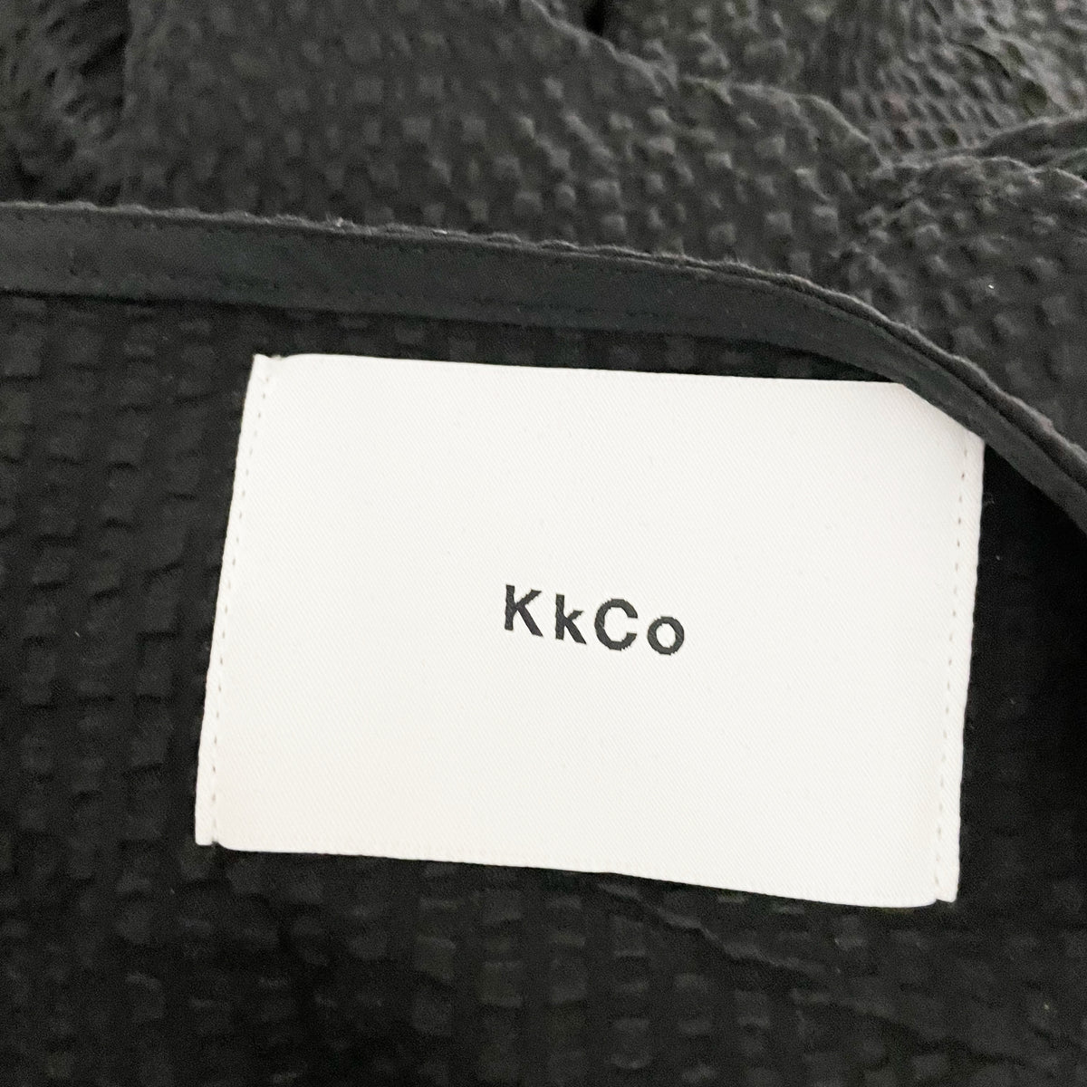 KKCO Climber One Shoulder Ruffle Asymmetrical Hem Textured Blouse Shirt Onyx XS