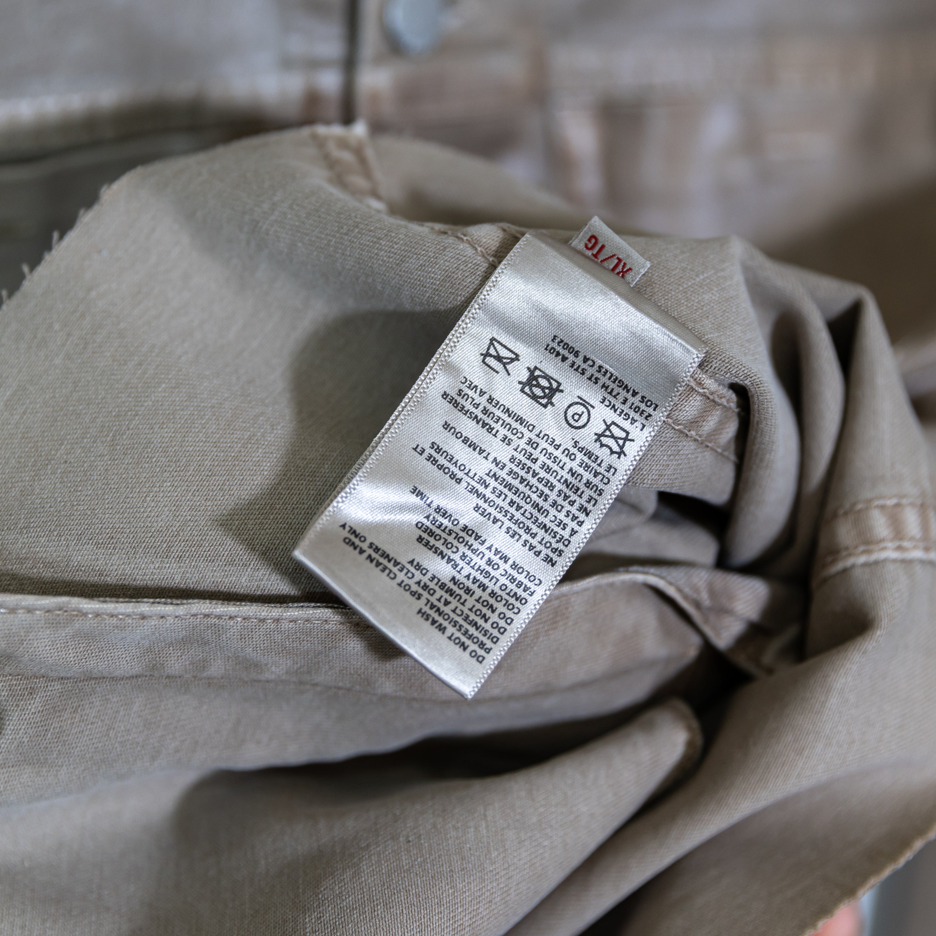 L'Agence Janelle Slim Cotton Coated Stretch Raw Edge Hem Button Jacket Biscuit